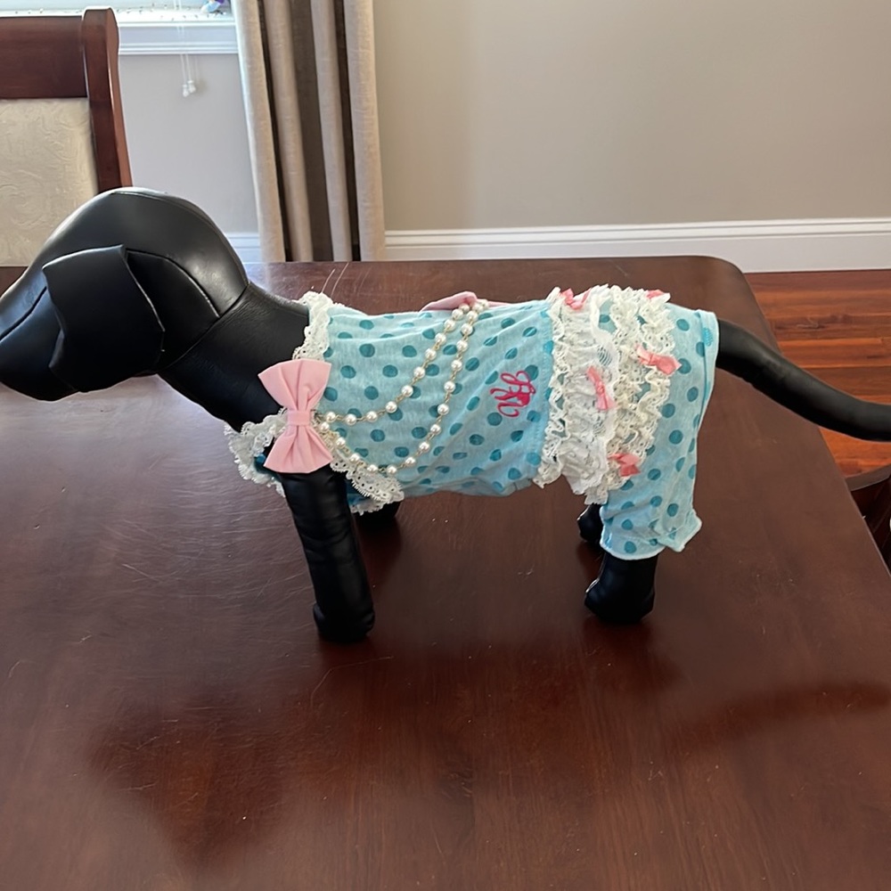 Wooflink size 4 Onesie light blue and pink with lace and pearl details.